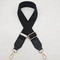 Adjustable black woven shoulder strap with geometric diamond pattern and gold metal hooks - Black + Black Leather