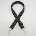 Close-up of leopard pattern strap with army green webbing and golden metal buckles - Gold Hook / Black Army Green