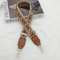 Close-up of ethnic embroidered bag strap with brown leather ends and gold metal clips - Beige/Brown With Gold Hook [Bellflower]