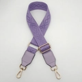 Detail of purple geometric jacquard woven strap with gold metal hooks and leather tabs - Light Purple