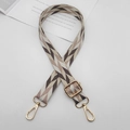 Detail of adjustable geometric patterned fabric shoulder strap with gold metal swivel hooks - Silver Hook / Antique Pink White Brown