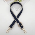 Detail of blue adjustable bag strap with white Greek fret pattern and gold metal hooks - Gold Hook / Beige Edge Blue