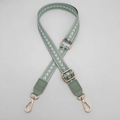 Detail view of adjustable woven bag strap in sage green with white chevron pattern - Matcha Green
