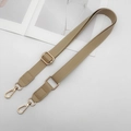 Detail of adjustable khaki PU leather shoulder strap with golden metal lobster clasps - Apricot