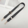 Close-up of dark grey PU leather adjustable bag strap with gold metal hooks and pebble texture - Dark Gray