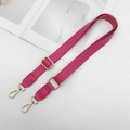 Detail showing rose red PU leather strap with golden metal swivel lobster clasps - Rose Red
