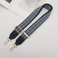 Detail of woven ethnic bag strap with geometric patterns and gold metal swivel hooks - Gold Hook / Blue with Black Trim