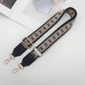 Close-up of ethnic geometric weave bag strap with golden hooks and leather ends - Black/Pink with Black Leather