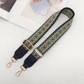 Detailed close-up of ethnic jacquard weave patterns and gold rotating buckles on straps - Olive Green with Black Leather