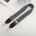 Detail of adjustable geometric weave strap with black leather ends and gold lobster claws - Black/Beige/Blue with Black Leather