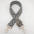 Detail of adjustable geometric ethnic strap with golden metal lobster clasps for bags - Dark Grey Light Grey / Gold