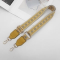 Close-up of yellow and grey geometric ethnic style wide adjustable bag strap with gold hooks - Yellow + Yellow Leather