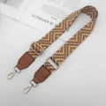 Detail of adjustable woven bag strap featuring gold metal hooks and geometric wave patterns - Gold Hook / Light Brown + Brown Leather
