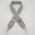 Adjustable gray Greek Key pattern bag strap with gold hardware and leather ends - Light Gray With Beige Edge