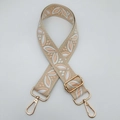 Detail of wide jacquard strap with leaf pattern and adjustable gold metal buckle - Beige Base Lotus Pink