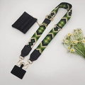 Detail of bohemian geometric woven shoulder strap with black coin purse and gold metal hooks - Black Grass Green Gold Hook Set