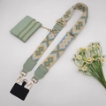 Detail view of woven bohemian shoulder strap with green leather pouch and gold hardware - Style 1 Beige Khaki Green Gold Hook Set