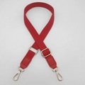 Detail of red canvas strap with gold metal buckle and leather reinforced ends for bags - Red