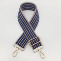 Detail of 5cm ethnic style striped wide bag strap with golden metal buckle and lobster clasp - Black and Blue