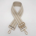 Detail of 5cm ethnic style wide woven bag strap with golden metal lobster hooks - Khaki