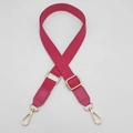 Detail view of rose red woven shoulder strap with gold hardware and swivel hooks - Rose Red