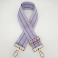 Detail of 5cm purple and white geometric woven strap with gold metal hooks and buckles - Light Purple