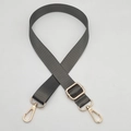 Close-up of adjustable dark gray nylon bag strap with polished gold metal hardware - Gold Hook / Dark Gray
