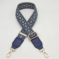 Close-up of adjustable woven shoulder strap with blue geometric pattern and gold hooks - Type 2 Blue With Blue Leather
