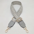 Detail of adjustable wide woven bag strap with ethnic geometric patterns and gold clips - Type 1 Gray With Gray Leather