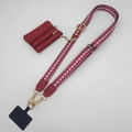Detail of adjustable wine red geometric phone strap with matching zipper coin purse - Wine Red + Gold Hook