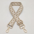 Detail of jacquard geometric guitar strap with adjustable shiny gold metal buckles - Beige/Apricot
