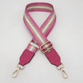 Detail of adjustable woven replacement bag strap with pink, gold, and white stripes - Gold Hook / Rose Red Gold Thread + Rose Red Leather
