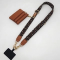Detail view of leopard print strap and brown PU leather coin purse with gold zippers - Dark Brown Black Brown Leather