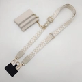 Detail of adjustable woven phone strap with matching mini pouch and gold hardware - White and Beige