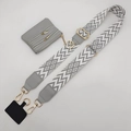 Detailed view of gray patterned crossbody strap with mini pouch and gold hardware hooks - Light Gray