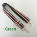 Detail view of woven green and red striped cotton bag strap with gold metal buckles - Green Red & Beige Striped (Gold Buckle)