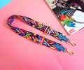 Detail of colorful geometric woven bag strap with golden metal lobster clasps and blue leather ends - Blue (Blue Edging)