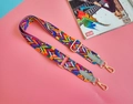 Detail view of colorful ethnic pattern shoulder strap with gold metal hooks and leather - Gray (Gray Edging)
