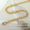 Detail shot of golden metal flat chain strap with polished lobster clasp for handbags - Gold Swivel Hook 110cm