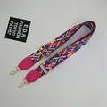 Close-up of adjustable ethnic geometric pattern handbag strap with golden metal lobster clasps - Colorful Rose Pink