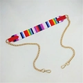 Detail of colorful rainbow woven shoulder strap with red leather ends and gold chain links - 120cm Long / Tone + Red