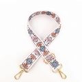 Tracolla larga con stampa floreale etnica e fibbie dorate su sfondo bianco - Larghezza: 3.8cm / Nuovo Bordo Bianco