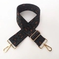 Close-up of leopard print woven bag strap with adjustable buckle and gold metal hooks - Green Leopard