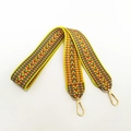 Adjustable woven shoulder strap with yellow red and green chevron pattern and gold clips - Yellow