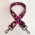 Detail of adjustable leopard print nylon shoulder strap with gunmetal swivel snap hooks - Rose Red Gunmetal Buckle