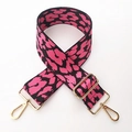 Detailed view of adjustable leopard print bag strap with polished gold-tone metal hooks - Rose Pink Leopard Print