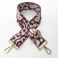 Detail of adjustable leopard print bag strap with vintage purple weaving and gold hooks - Purple Leopard