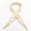 Tracolla regolabile in tela color crema per borse con robusti moschettoni in metallo oro - Bianco