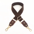 Detail of adjustable dark brown wide cotton shoulder strap with gold metal lobster hooks - Coffee