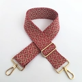 Detail van verstelbare katoenen tasriem met rood en wit geometrisch ruitpatroon - Rood